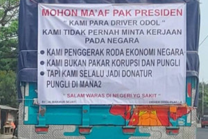 Ketika Truk Menjadi Papan Pengumuman Negara yang Sakit  Membaca Spanduk Sopir ODOL dalam Perspektif Linguistik Lanskap