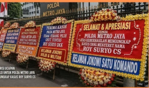 Karangan Bunga, Semiotika Kekuasaan, dan Pengadilan Opini